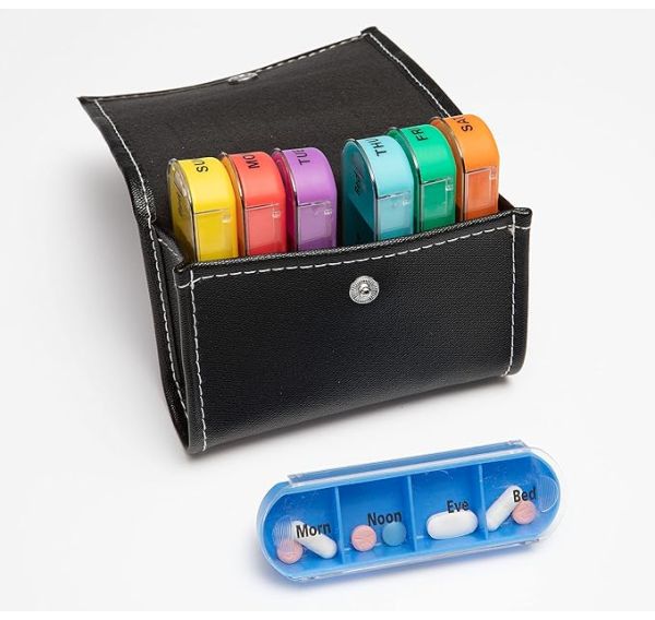 Wallet open showing pill storage compartments.