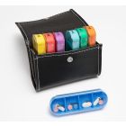 Wallet open showing pill storage compartments.